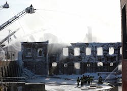 Firefighters from throughout New Jersey continue to fight the Passaic fire Saturday morning. Firefighters from throughout New Jersey continue to fight the Passaic fire Saturday morning.