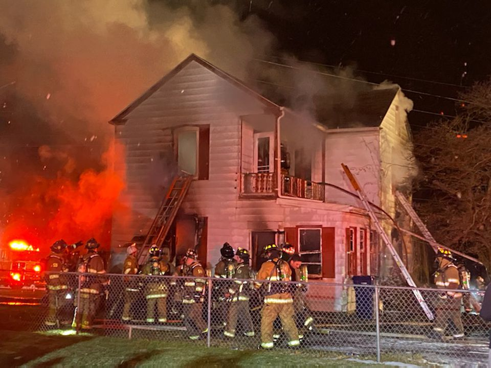 One person is dead and a firefighter was sent to the hospital at a two-alarm fire in Royalton.