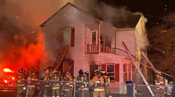 One person is dead and a firefighter was sent to the hospital at a two-alarm fire in Royalton.