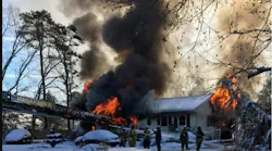 Firefighters battle heavy fire conditions in a Stafford Township dwelling fire.
