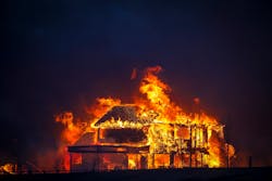 A home burns after a fast-moving wildfire swept through the area in the Centennial Heights neighborhood of Louisville, Colorado on Thursday, Dec. 30, 2021. A home burns after a fast-moving wildfire swept through the area in the Centennial Heights neighborhood of Louisville, Colorado on Thursday, Dec. 30, 2021.