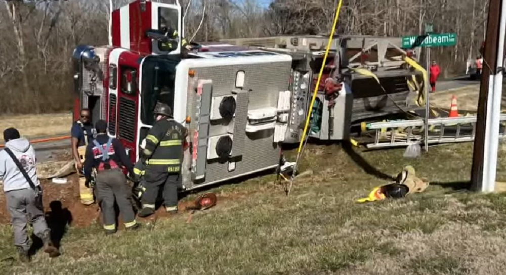 Three Crowders Mountain firefighters were hospitalized after their pumper overturned south of Gastonia.