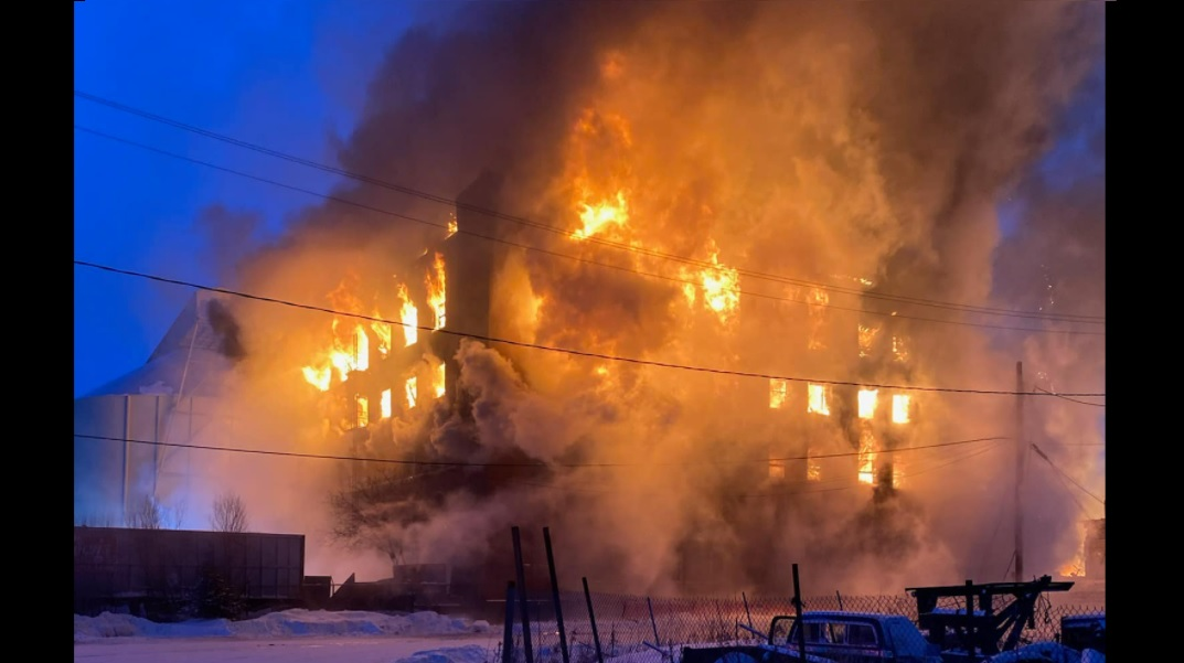 Superior firefighters battled heavy fire conditions in one of two four-story warehouses destroyed Thursday morning.