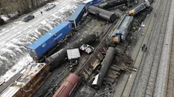 Crews assess the aftermath of a train derailment in Avon.