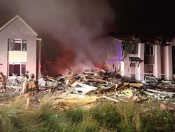 Fire officials believe a gas appliance led to an explosion that destroyed one home and damaged others. Fire officials believe a gas appliance led to an explosion that destroyed one home and damaged others.