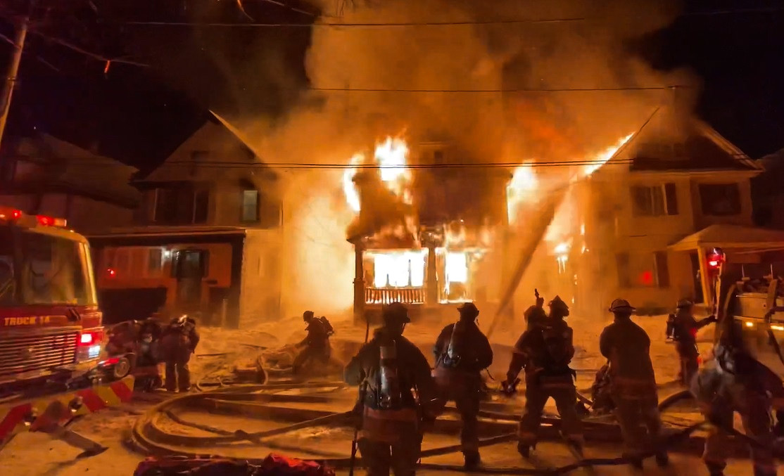Buffalo firefighters battled a three-alarm fire in multiple single family dwellings early Monday morning.