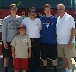 James P. Smith (far right) with, from left, grandson Tyler Guidos, grandson Brendan Smith, son James P. Smith Jr. and grandson Justin Guidos. James P. Smith (far right) with, from left, grandson Tyler Guidos, grandson Brendan Smith, son James P. Smith Jr. and grandson Justin Guidos.