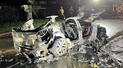 After initial knockdown, the remains of a burnt Tesla Model S received copious amounts of water for almost two hours. Note some of the more than 7,000 rechargeable battery cells on the street in the runoff from this fire. After initial knockdown, the remains of a burnt Tesla Model S received copious amounts of water for almost two hours. Note some of the more than 7,000 rechargeable battery cells on the street in the runoff from this fire.