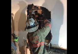 Montgomery County firefighters work to free a man who got stuck in a chimney. Montgomery County firefighters work to free a man who got stuck in a chimney.