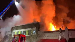 Multiple agencies work to control heavy fire conditions in downtown Hillsboro early Sunday morning.