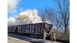 Firefighters in Athens battled multiple rail cars on fire that were hauling railroad ties.