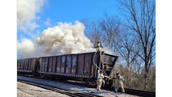 Firefighters in Athens battled multiple rail cars on fire that were hauling railroad ties.