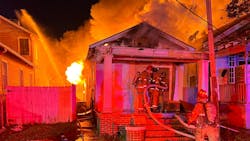 Firefighters battle the first of two multiple alarms fires Wednesday morning in New Orleans.