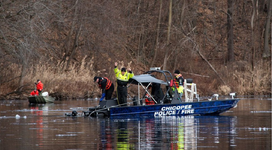 Members of the Chicopee police and fire departments, Massachusetts State Police and Massachusetts Environmental Police search the Chicopee River for a missing child in 2019.