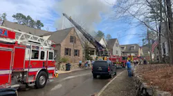Fire swept through a Mt Laurel home Wednesday morning during which two firefighters had to issue Mayday calls when they became lost and disoriented inside the burning house.