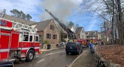 Fire swept through a Mt Laurel home Wednesday morning during which two firefighters had to issue Mayday calls when they became lost and disoriented inside the burning house.