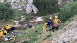 Cal Fire/Riverside County firefighters rescued six vehicle occupants after their vehicle flew off a cliff.