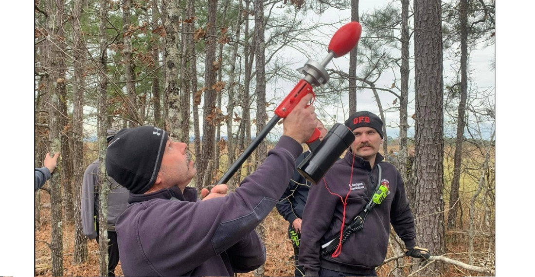 Firefighters with the Gadsden Fire Department had to rescue a National Guardsman stuck in a tree after a parachute jump.