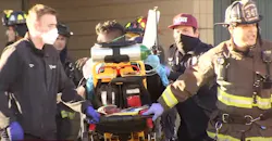 Multiple rescues were made at a two-alarm high-rise fire that injured five people, including three firefighters in Oakland.