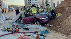 Three people were injured when scaffolding collapsed on a vehicle at a construction site in Mansfield.