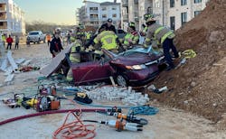 Three people were injured when scaffolding collapsed on a vehicle at a construction site in Mansfield. Three people were injured when scaffolding collapsed on a vehicle at a construction site in Mansfield.