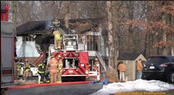 A father and son used a ground ladder to rescue three neighbors and their dog after their house caught fire in Heidelberg Township. A father and son used a ground ladder to rescue three neighbors and their dog after their house caught fire in Heidelberg Township.