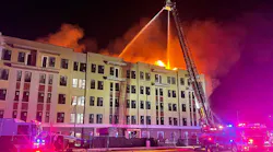 Oklahoma City firefighters battle a massive fire in a 5-story apartment complex under construction.