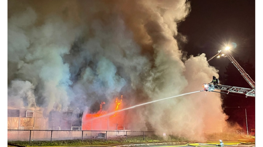 Multiple fire departments battled a two-alarm fire at the former Maywood Elementary School in SeaTac.