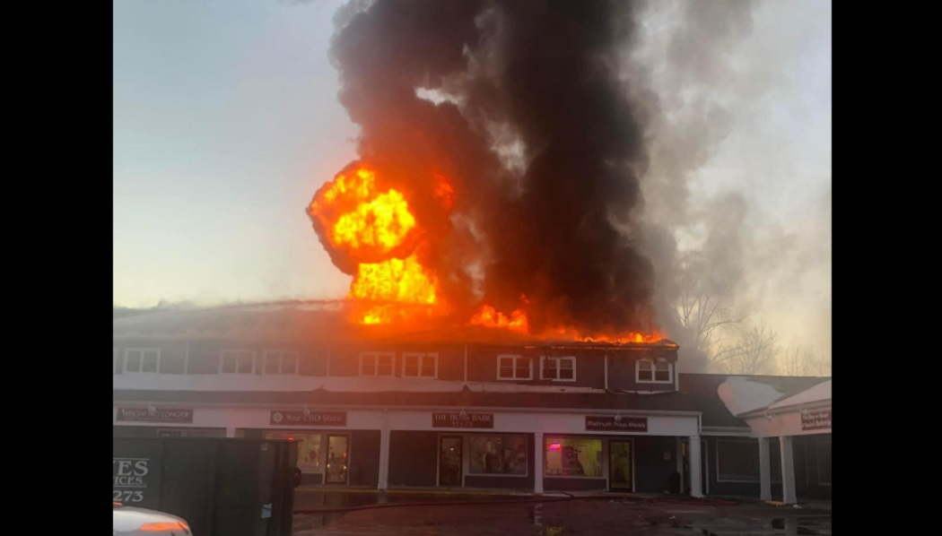 Multiple agencies battled a three-alarm fire that left over a dozen homeless and damaged businesses in East Lyme.