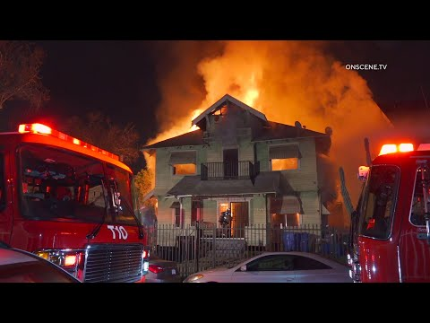 A massive fire in Los Angeles left two injured and damaged three homes.