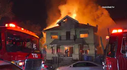 A massive fire in Los Angeles left two injured and damaged three homes.