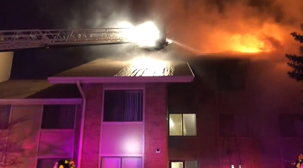 Flames spread from a third floor apartment to the attic of the Lakewood senior living building.