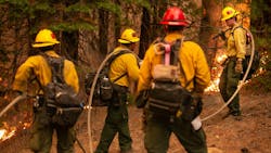 Firefighters conduct a controlled burn on Hwy. 50 in Strawberry, CA during the 2021 Caldor fire. Firefighters conduct a controlled burn on Hwy. 50 in Strawberry, CA during the 2021 Caldor fire.