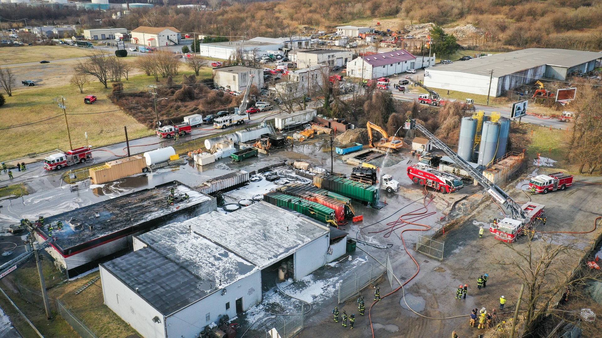 Firefighters from Baltimore and surrounding fire departments at the three-alarm fire scene Monday morning.