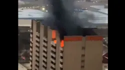 Dozens of Dallas firefighters responded to a fire in a 25-story apartment building.