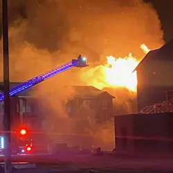 Several fire departments responded to a fire that engulfed an apartment complex under construction in Mills Friday night. Several fire departments responded to a fire that engulfed an apartment complex under construction in Mills Friday night.
