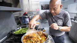 Seminole County firefighter/paramedic Jose Neluna prepares caldereta, a traditional Filipino dish.