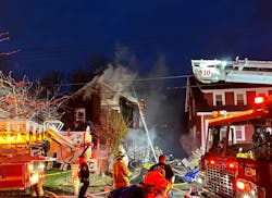 Firefighters work to extinguish a house fire on Fenway Drive on Saturday, March 26, 2022. Firefighters work to extinguish a house fire on Fenway Drive on Saturday, March 26, 2022.
