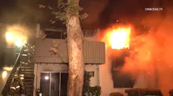 Anaheim firefighters battled a two-alarm second story apartment fire that injured one civilian.