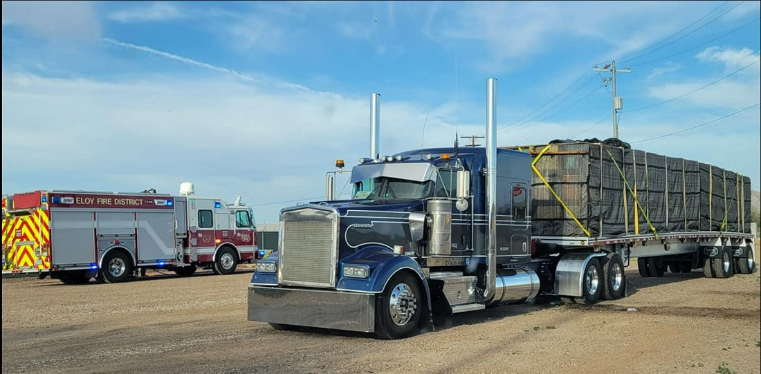 Firefighters with the Eloy Fire District were called to save hundreds of thousands of bees being transported.