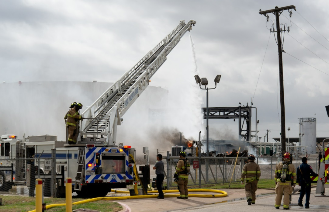 Fort Worth and Euless firefighter battle a tanker carrying jet fuel after it exploded and caught fire at a fueling terminal.