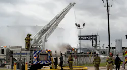 Fort Worth and Euless firefighter battle a tanker carrying jet fuel after it exploded and caught fire at a fueling terminal.