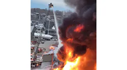 Firefighters work to control a massive blaze in a Belfast potato processing plant.