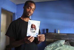 Keishawn Johnson Sr. holds a picture of his son Keishawn, who died on Jan. 1. When no one answered a series of 911 calls about the unresponsive baby on Jan. 1, a desperate Johnson jumped into a friend's car, trying to administer CPR during the 4-mile trip to Broward Health North, where efforts to revive the baby were unsuccessful. Keishawn Johnson Sr. holds a picture of his son Keishawn, who died on Jan. 1. When no one answered a series of 911 calls about the unresponsive baby on Jan. 1, a desperate Johnson jumped into a friend's car, trying to administer CPR during the 4-mile trip to Broward Health North, where efforts to revive the baby were unsuccessful.