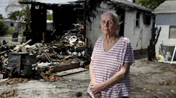 Judith Garwood stands in front of her Hollywood home that went up in flames on April 10.