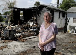 Judith Garwood stands in front of her Hollywood home that went up in flames on April 10. Judith Garwood stands in front of her Hollywood home that went up in flames on April 10.