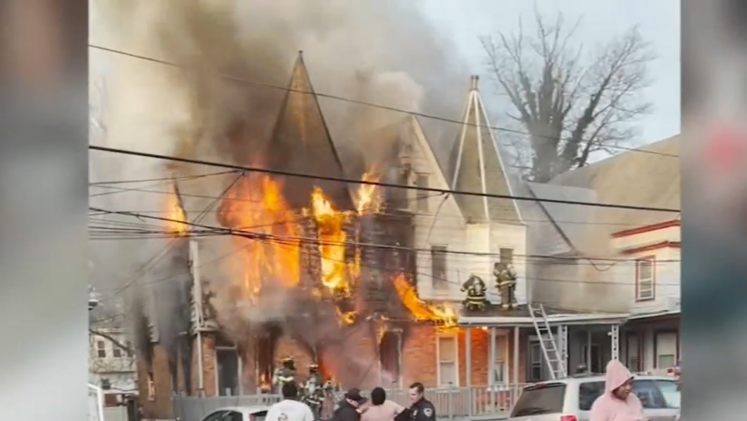 A massive house fire in Trenton took the lives of twin brothers and injured four Trenton firefighters.