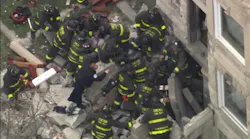 An adult male is dead, and two others seriously injured when part of a Chicago home collapsed onto them.