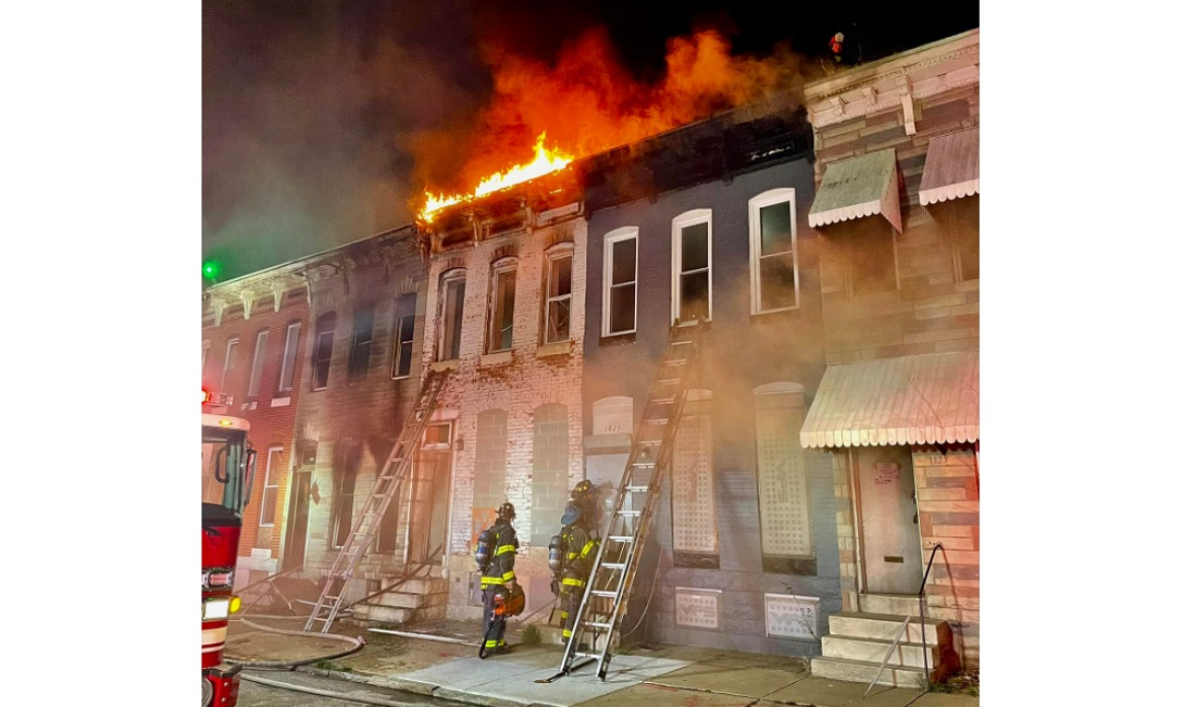 A Baltimore firefighter was injured after falling through the floor while checking for extension at a vacant rowhome fire.