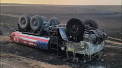 Two Balko firefighters were injured when their fire truck when down an embankment and rolled over.